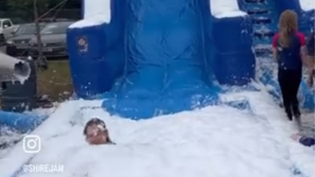 Scout at end of foam slide